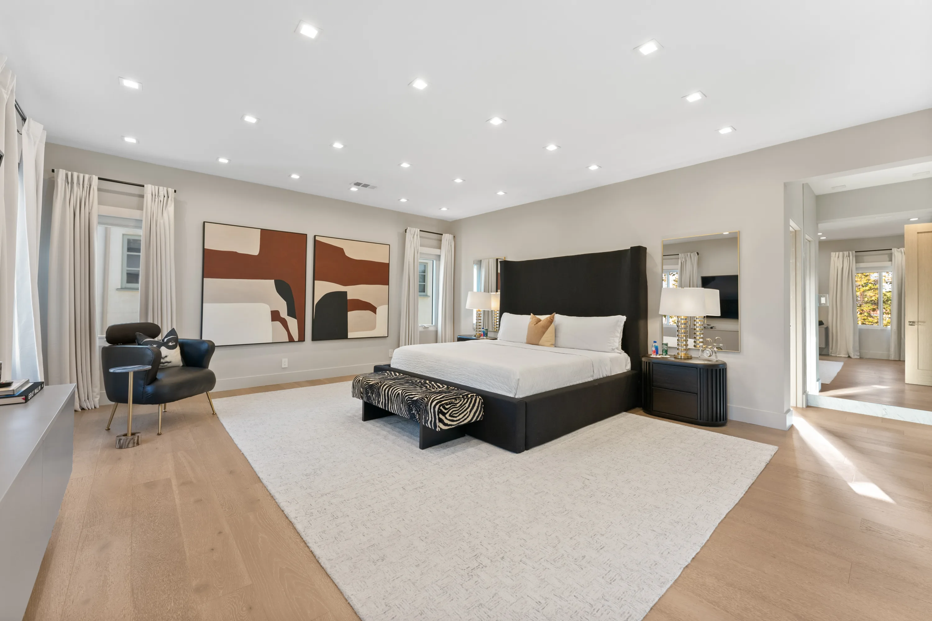 Luxurious primary bedroom at Rodeo Villa, a Beverly Hills vacation rental featuring elegant furnishings, contemporary design, and a serene, private retreat.