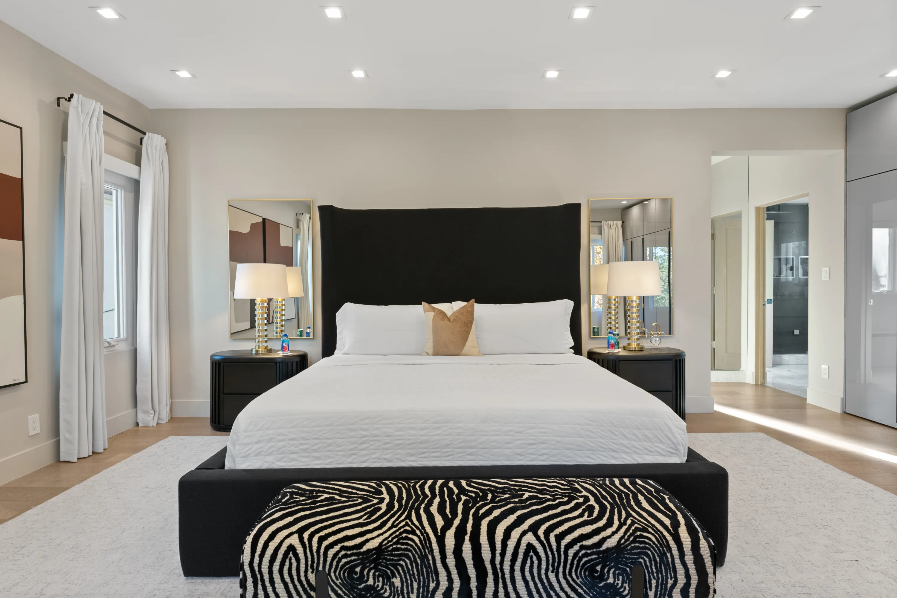 Luxurious primary bedroom at Rodeo Villa, a Beverly Hills vacation rental featuring elegant furnishings, contemporary design, and a serene, private retreat.