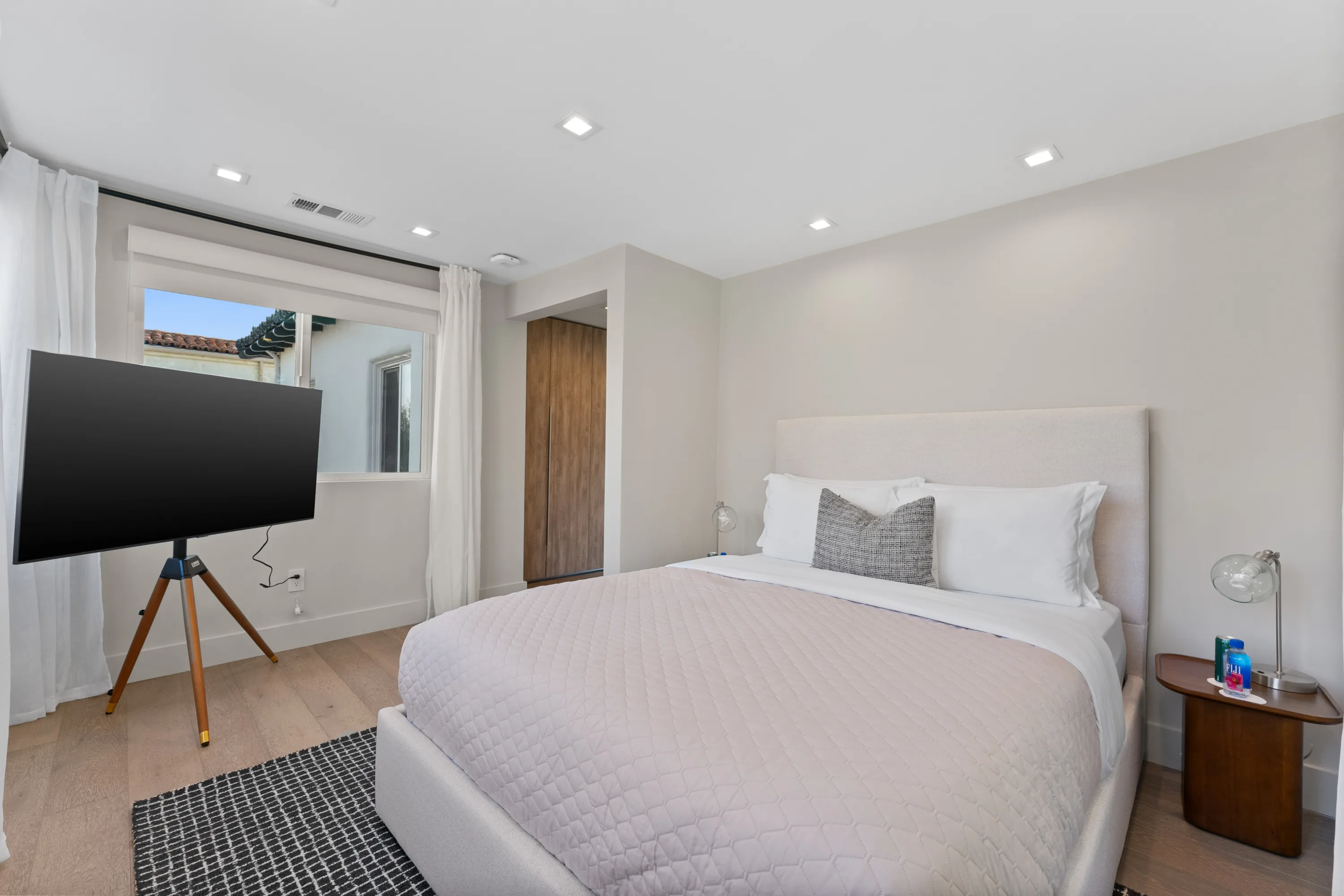 Elegant guest bedroom at Rodeo Villa, a luxury Beverly Hills vacation rental offering a comfortable, private retreat with refined contemporary interiors.