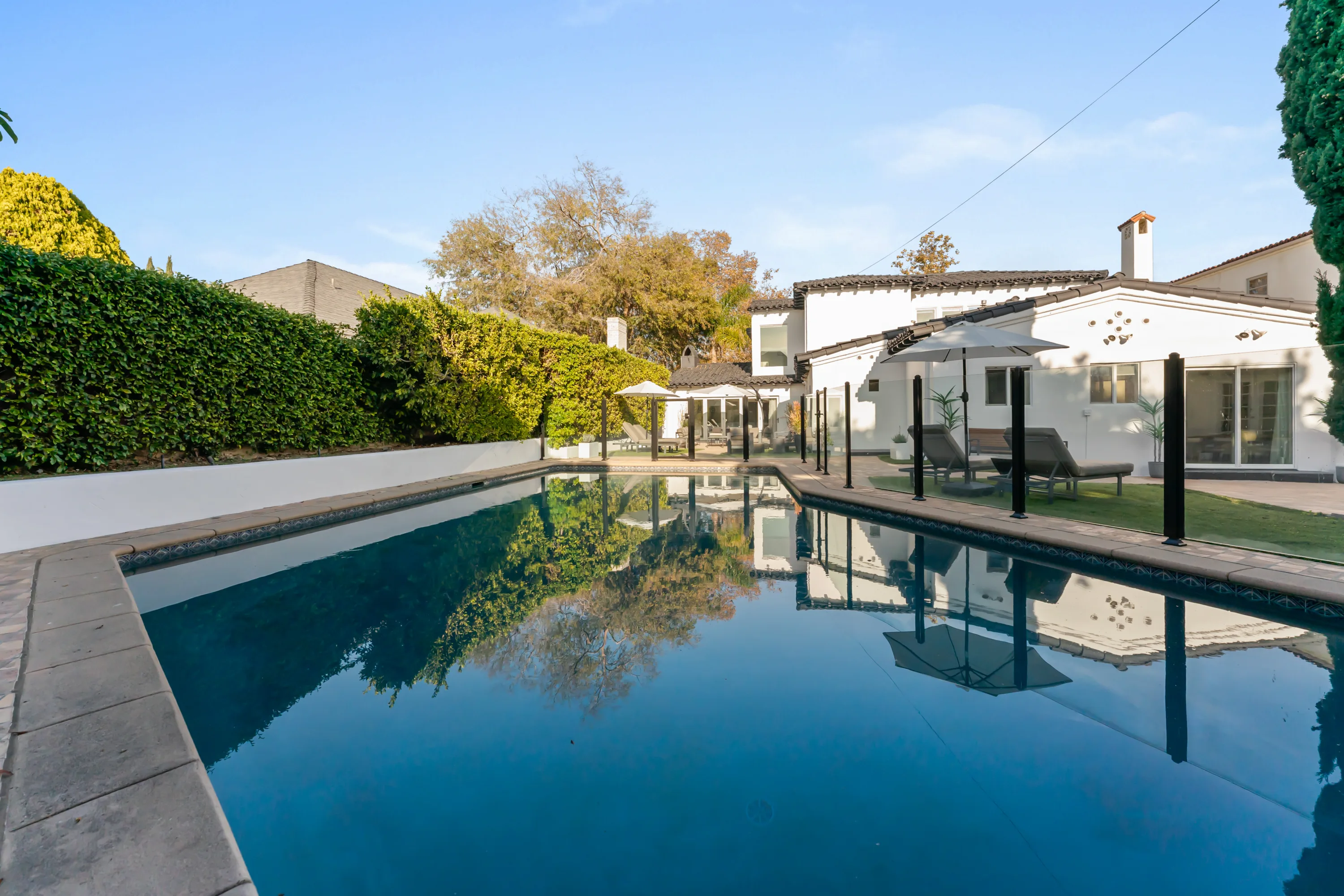 Pool at Rodeo Villa, a luxury Beverly Hills vacation rental featuring a private outdoor setting, lounge space, and elevated indoor-outdoor living.