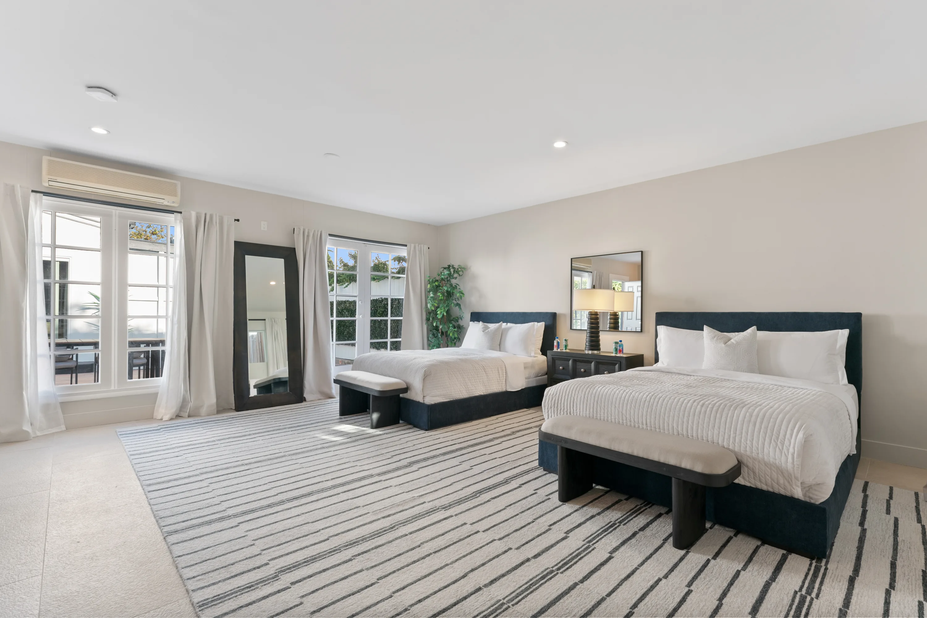 Detached guest house at Rodeo Villa, a luxury Beverly Hills vacation rental featuring two queen beds, comfortable accommodations, and added privacy.
