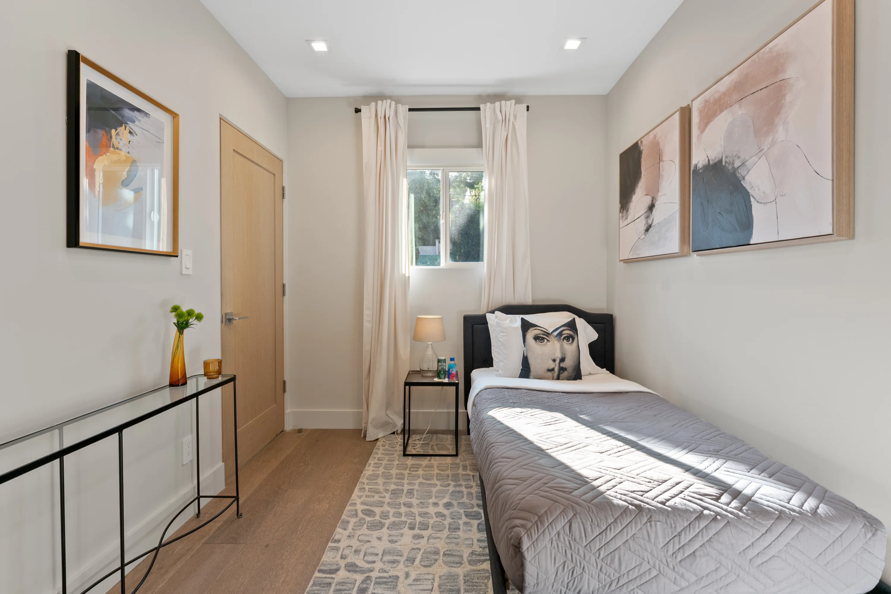 Cozy guest bedroom at Rodeo Villa, a luxury Beverly Hills vacation rental featuring a twin bed, comfortable furnishings, and a private retreat for guests.